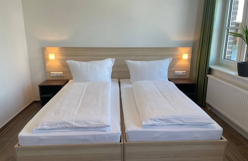 Pasewalk Cama Y Desayuno | Guest house vacation apartment - Guest house 109 - Lokschuppen Pasewalk- Guest houses with