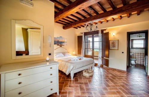 Castiglione del Lago Apartamento | GuestHost - Il Glicine, apt with garden and pool