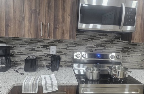 Airdrie Apartamento | Guesthouse in Airdrie-South West