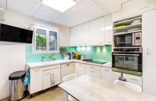 Les Viselets Apartamento | GuestReady - Encantadora casa con jardín privado