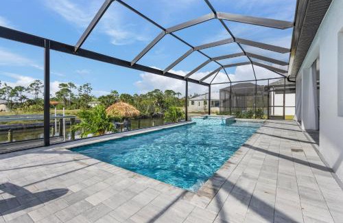Burnt Store Casa | Gulf Access Home, Heated Saltwater Pool & Spa, Dock and Tiki Hut - Villa Perchside Palace