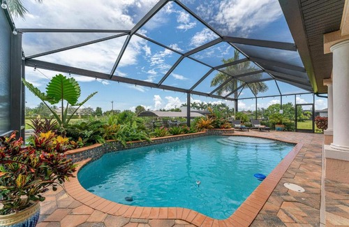 Burnt Store Casa | Gulf Access Sleeps 8 - Villa Tropicana - Roelens Vacations
