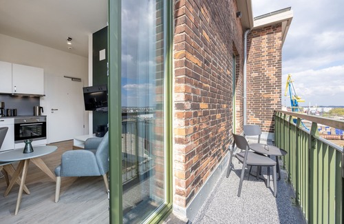 Wismar Apartamento | Hübsches Apartment mit Balkon, Hafenblick und Saunanutzung in Erstklassiger Lage