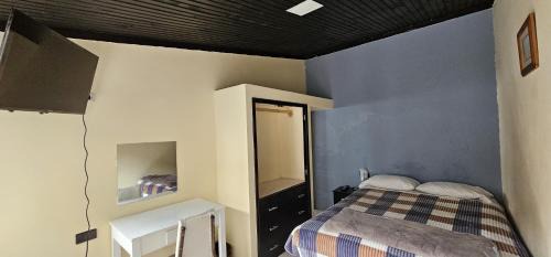 Tulcán Apartamento | Habitación con baño privado