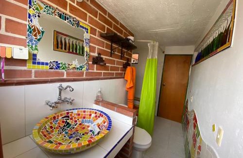 La America Apartamento | Habitaciónes en Casa Ithaca en Floresta - Santa Lucía