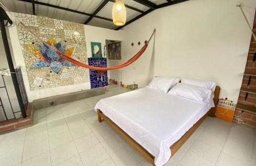 La America Apartamento | Habitaciónes en Casa Ithaca en Floresta - Santa Lucía