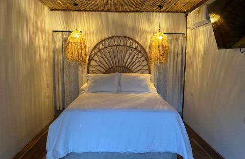 Mata de Platano Cabina | Habitacion Luxury Loto en La casa de la Wii en Mendihuaca, a 10 minutos del Parque Tayrona