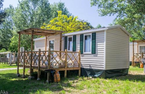 Ipsos Otro | Happy Camp mobile homes in Karda Beach Camping