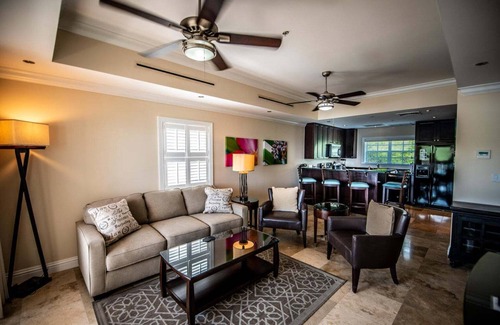 Great Cruz Bay Condominio | Happy Does- 1 BR Grande Bay Unit with Stunning Views of Cruz Bay! Walk to town!