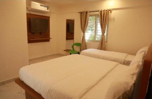S R Layout Hotel | Happy homes stays