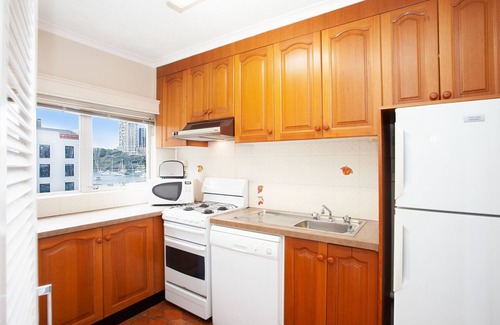 McMahons Point Apartamento | Acogedor apartamento junto al puerto con piscina con vistas al puente