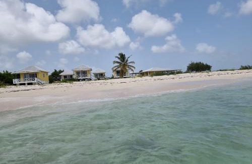 Codrington Casa | Harrys Cottages Cottage 5 right on the pink sand