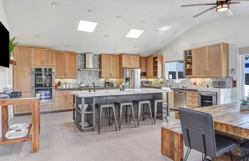 Sonoma Casa | Family Friendly Palmer Farmhouse Pool Spa Putting Green Walkable to DT