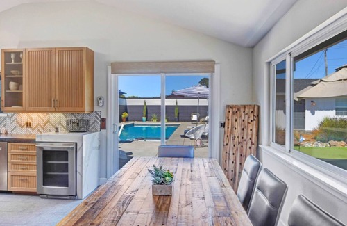 Sonoma Casa | Family Friendly Palmer Farmhouse Pool Spa Putting Green Walkable to DT
