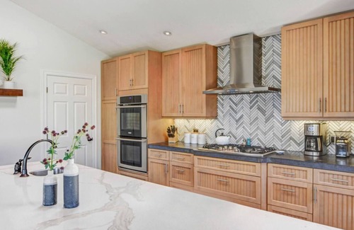 Sonoma Casa | Family Friendly Palmer Farmhouse Pool Spa Putting Green Walkable to DT