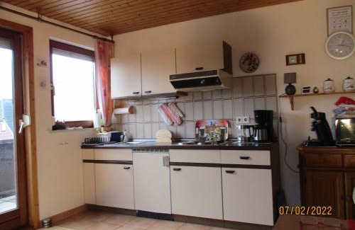 Stinteck Apartamento | Haus mit Lilie und Rose
