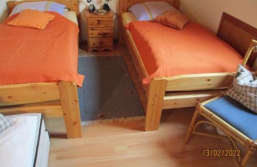 Stinteck Apartamento | Haus mit Lilie und Rose