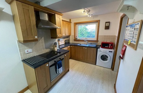 Torrin Cabaña | HAWTHORN DENE, pet friendly, cosy croft cottage with mountain views in Torrin