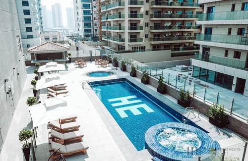 Jumeirah Village Circle Apartamento | HE Hotel Apartments