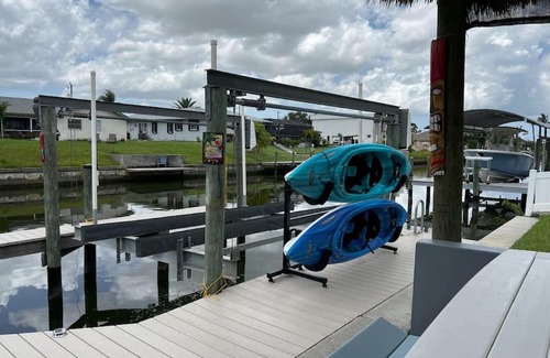Cape Coral Casa | Heated pool, Family Fun, Tiki Bar, kayak, 3bd 2ba