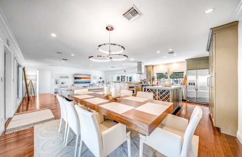 Garden Isles Casa | Heated Pool! WaterFront Home! 1 Mile To Beach!