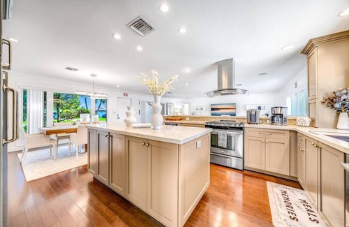 Garden Isles Casa | Heated Pool! WaterFront Home! 1 Mile To Beach!