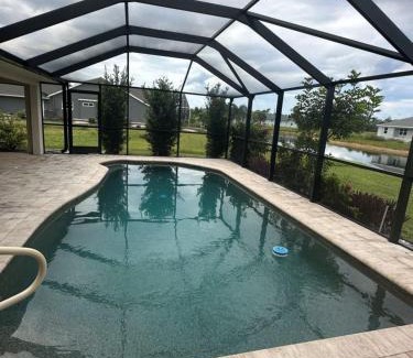 Pebble Beach Casa | Heated pool with canal views