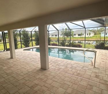 Pebble Beach Casa | Heated pool with canal views