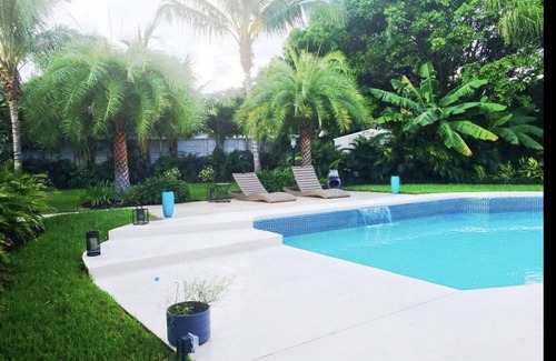 Lake Ida Shores Casa | Heated Saltwater Pool! Beautiful Activity Filled Three BR Home Downtown Delray