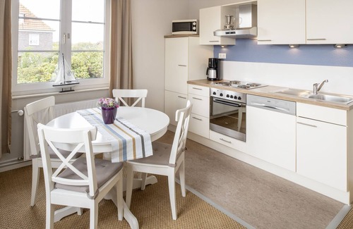 Langeoog Apartamento | Helle Ferienwohnung auf Langeoog mit Gartennutzung für bis zu Vier Personen