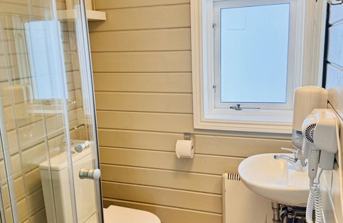 Hvolsvollur Hotel | Hellisholar Cottages