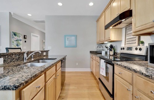 Southport Casa | Hello Sunshine Townhome