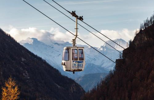 Valtournenche Apartamento | HelloChalet - Maison Paquier - Family Ski Holiday in the resort center
