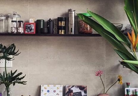 Can Tho Casa | Here Library - A wooden home by the river with a library