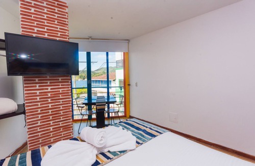 Guatape Hotel | Hermosa Habitación Suite Deluxe En Guatape