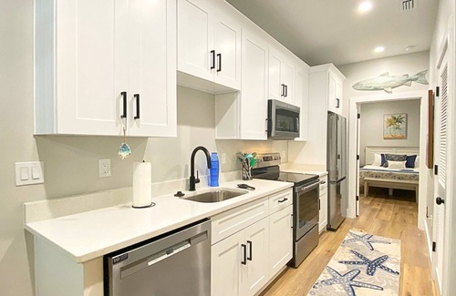 Port St. Joe Cabaña | "Heron Cottage" is a pet friendly, 1 bed, 1 1/2 bath unit accommodating 4 guests. Community Pool.