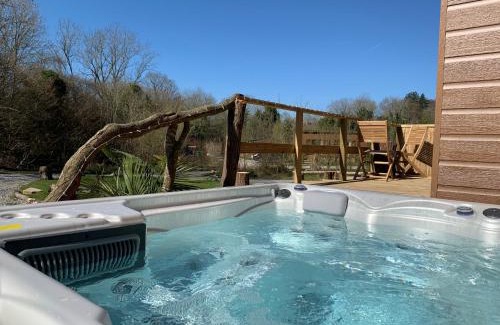 Caerwys Complejo | Herons Lake Retreat Hot Tub Lodges