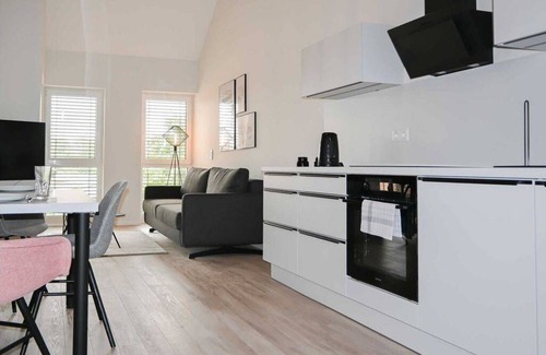 Suderneuland I Apartamento | Herzlich Willkommen in der Exklusiven Ferienwohnung Teefabrik Zentral in Norden