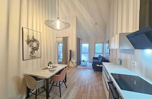 Suderneuland I Apartamento | Herzlich Willkommen in der Exklusiven Ferienwohnung Teefabrik Zentral in Norden