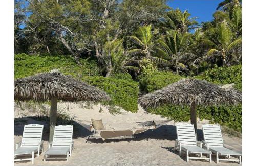 Dunmore Town Casa | Hibiscus Hill Guest House - Elegant Garden Oasis, Pink Sand Bch home