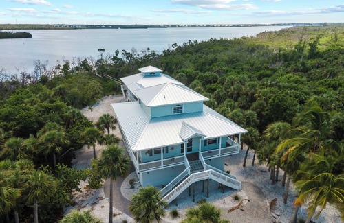 Palm Island Casa | Hidden Gem, peaceful and private tropical vacation home with a water overlook