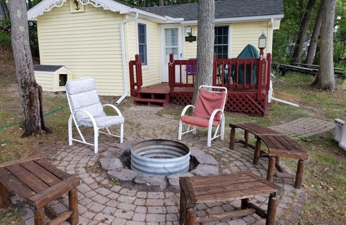 Higgins Lake Casa | Higgins Lakefront Cozy Beach House with Private Boat Mooring Onsite - Brass Bell