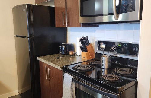 Strathcona Condominio | High-Rise Condo with water View | Near Stadiums