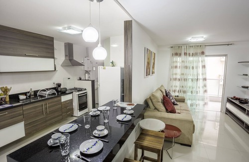 Vila Nova Apartamento | Apartamento de alto estándar en Praia do Forte 1 suite + 2 dormitorios con vistas al mar