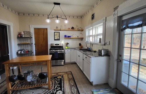 South Colton Casa | Historic 1840's home on Raquette River with creek, large lawn, view of waterfall