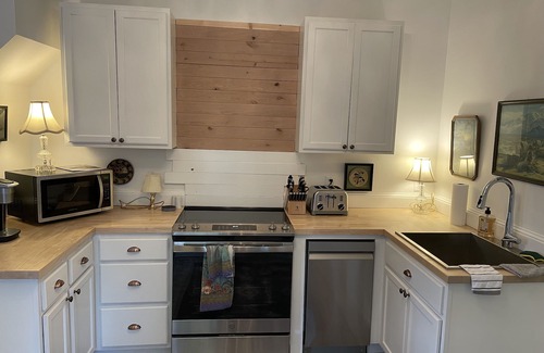 Stevensville Cabaña | Historic 2 bedroom home in downtown Stevensville. Pet friendly! RV parking