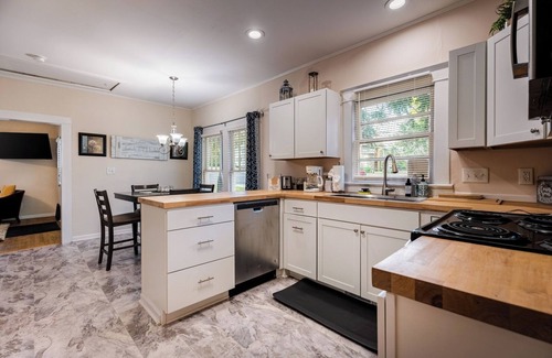 Cary Casa | Historic 2BR Retreat Walk to Eats Porch & Yard