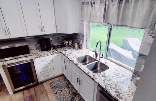 Clear Lake Shores Casa | Historic Renovated Kemah Home just a short walk to the Kemah Boardwalk.