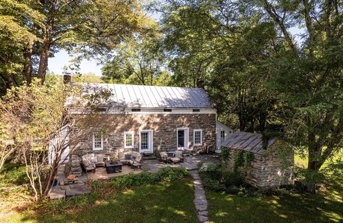 Accord Casa | Historic stone house & barn on 10 acres with patio, fireplace, & antique charm