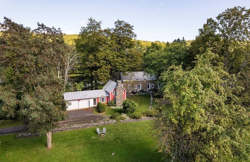 Accord Casa | Historic stone house & barn on 10 acres with patio, fireplace, & antique charm